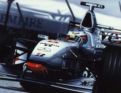 Mika Häkkinen driving through Monte Carlo's Casino Square on his way to race victory in 1998. McLaren Mercedes MP4/13.